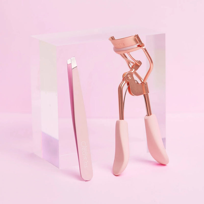 eyelash curler and tweezer